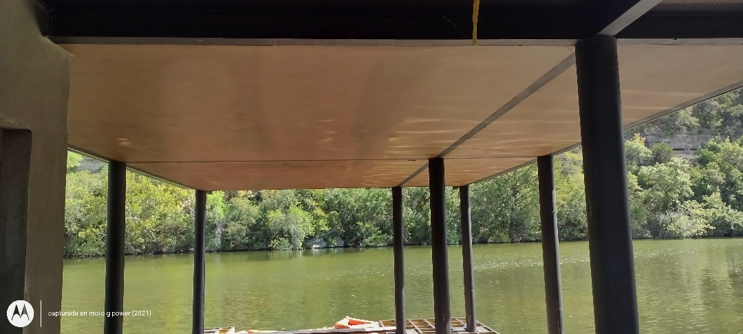 Approved ATX Lakescapes photograph of dock and boathouse work (F02).