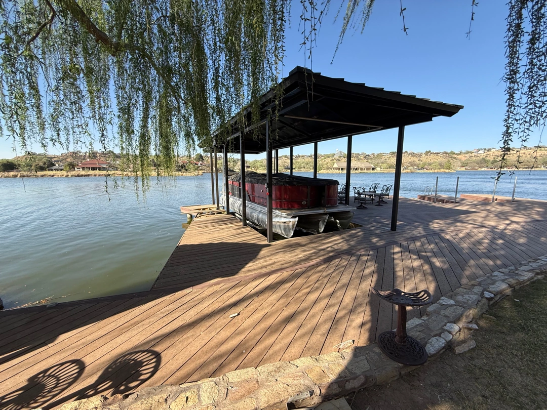 Approved ATX Lakescapes photograph of dock and boathouse work (F04).