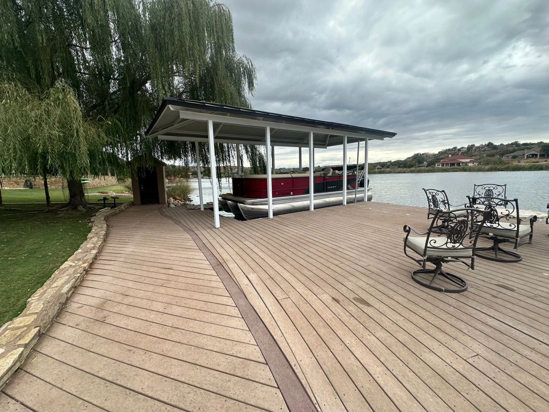 Approved ATX Lakescapes photograph of dock and boathouse work (F05).