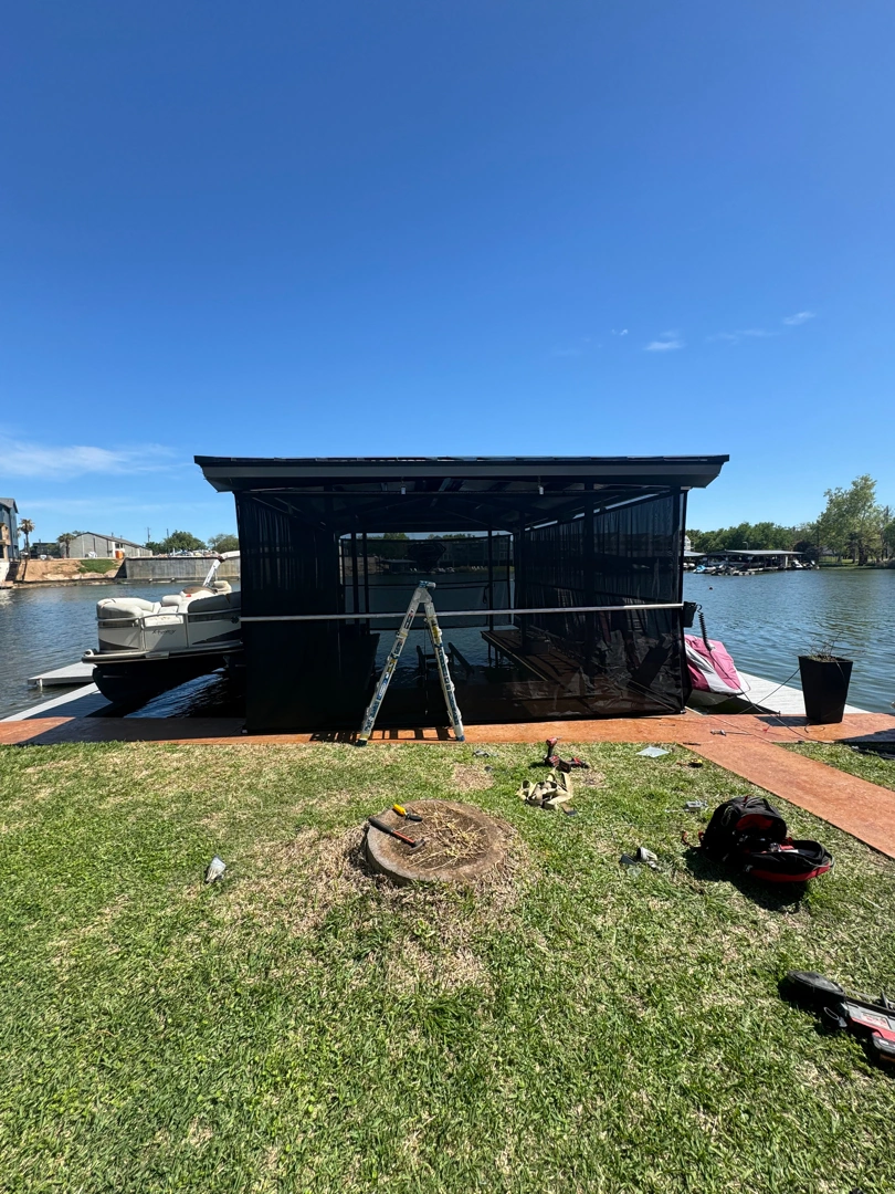 Approved ATX Lakescapes photograph of dock and boathouse work (F10).