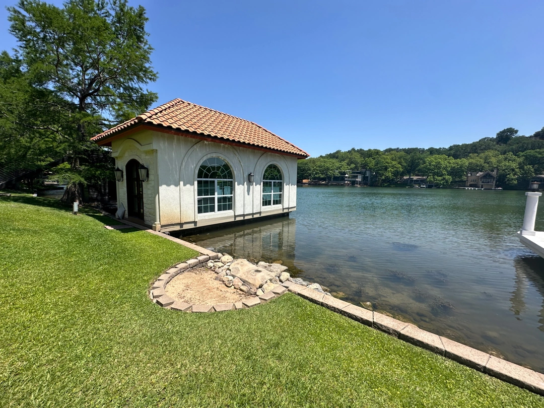 Approved ATX Lakescapes photograph of dock and boathouse work (F12).