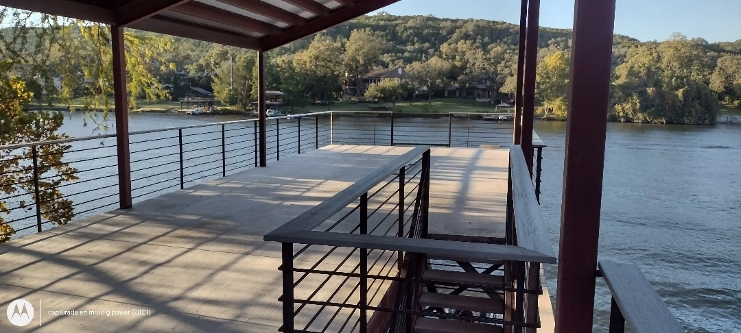 Approved ATX Lakescapes photograph of dock and boathouse work (F14).