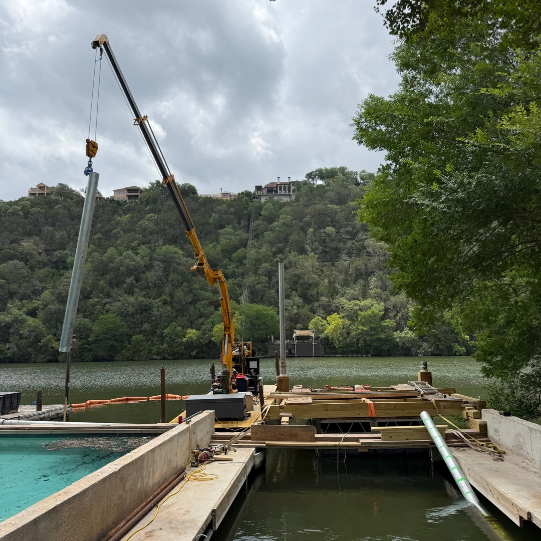 Approved ATX Lakescapes photograph of marine construction work and equipment (F22).