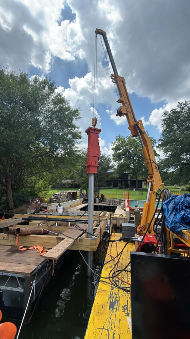 Approved ATX Lakescapes photograph of marine construction work and equipment (F36).